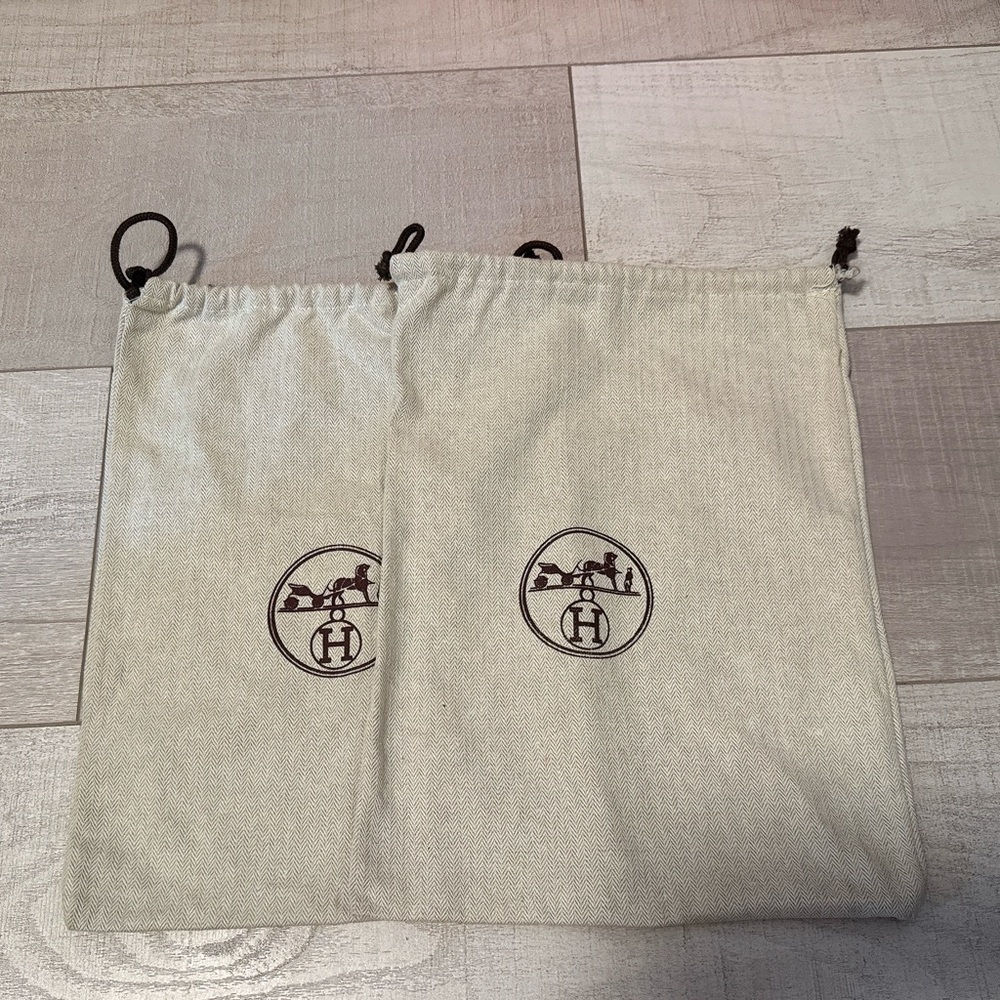 Hermes Cream Drawstring Pouches